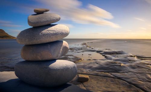 Rocks balanced on top of each other at the beach